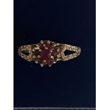 9ct gold ring set with red stones Size M