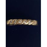 9ct Gold ring set with 5 diamonds Size K
