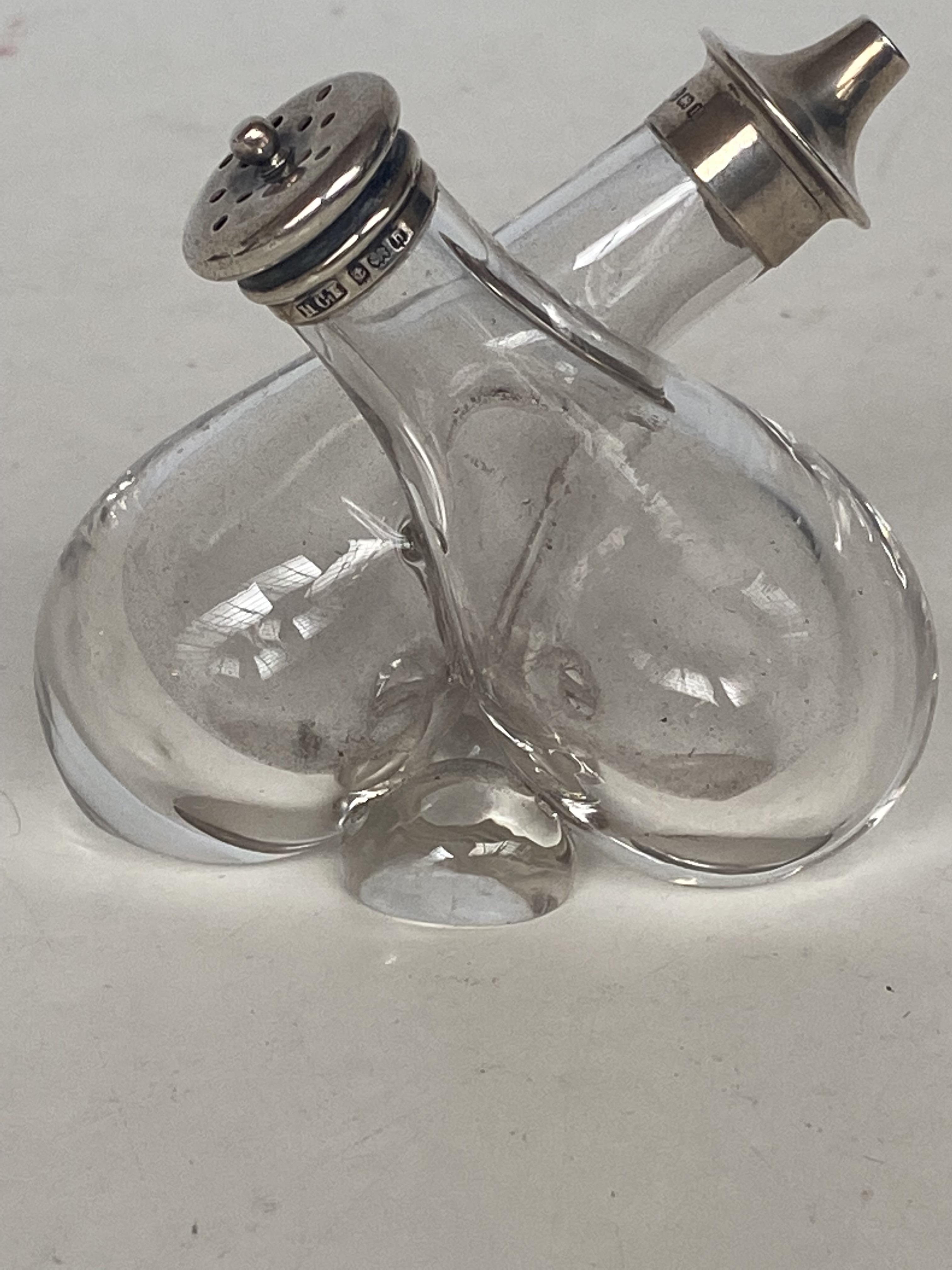 Silver topped oil & vinegar bottles