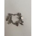 Silver charm bracelet - 11 charms