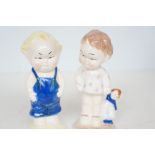 Pair of Shelley boy & girl figures