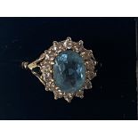 9ct Gold ring set with blue stone