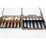 Cased set of silver plated spoons together with EP