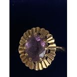 9ct Gold ring set with large purple stone Size O