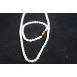 Cultured pearl necklace & bracelet