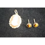 9ct gold cameo together with a pair of tigers eye