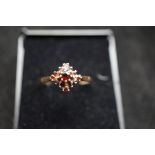 9ct Gold cluster ring set with red stones Weight 1