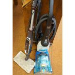 Vax carpet cleaner together with a shark floor cle