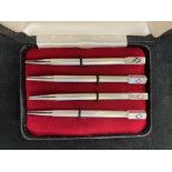 Cased set of 4 silver propelling pencils