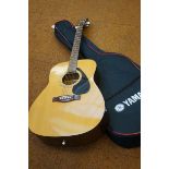 Yamaha f310 acoustic guitar with soft case