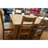 Excellent quality solid oak dining table and 6 cha