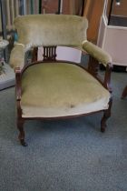 Victorian club chair with velvet upholstery on ori