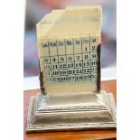 Silver early 20th century desk calendar