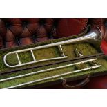 Vintage trombone in plush fitted case