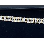9ct gold bracelet - 68 diamonds
