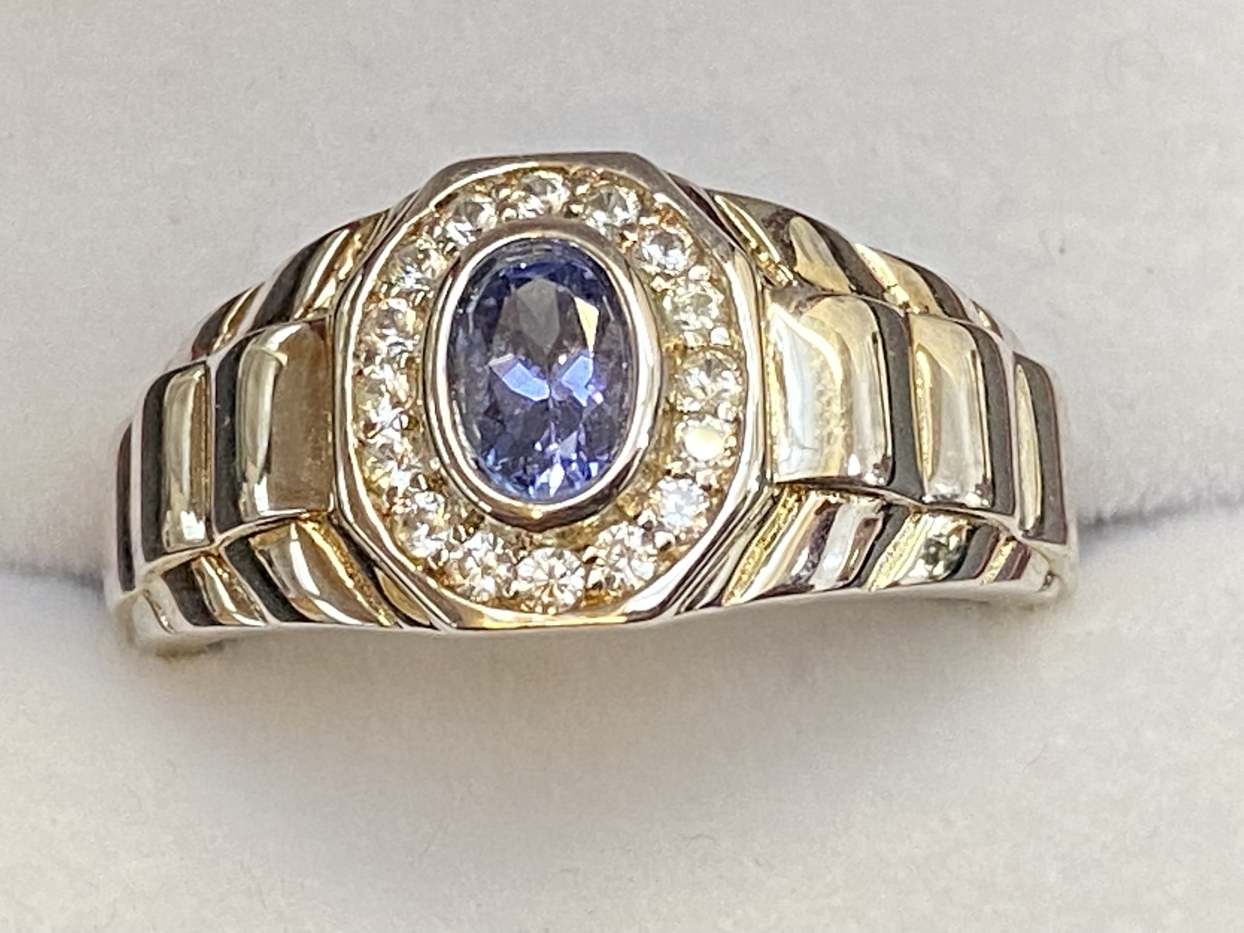 Gents silver ring with central tanzanite stone