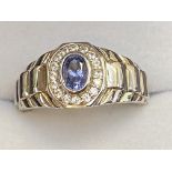 Gents silver ring with central tanzanite stone
