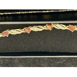 9ct Gold bracelet set with red garnets & diamonds