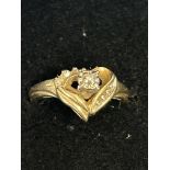 9ct Gold heart shaped ring set with diamonds Weigh