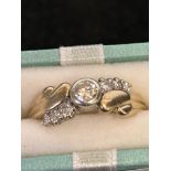 9ct Gold ring set with 7 diamonds Weight 2.9g Size