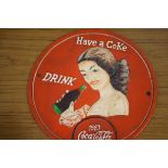 Cast iron coca-cola sign