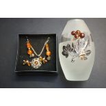 Collection of amber jewellery together with a case