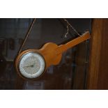 Retro clock in the form of a guitar