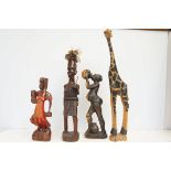 4 African carved figures Largest 60 cm