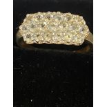 9ct gold ring set with clear stones Weight 3.2g Si