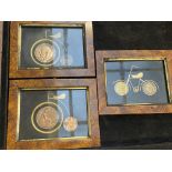 Framed coins in form of bicycles