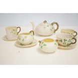 Belleek part tea set - black back stamp (some age ware, 1 cup cracked)