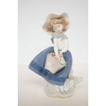 Lladro figure of a young girl with basket