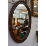 Large oval bevelled mirror