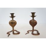 Pair of eastern candle sticks in the form of snake