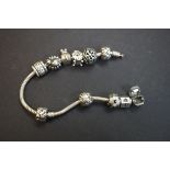 Pandora charm bracelet with various charms