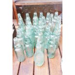 Collection of cod bottles, majority with marbles
