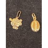 2x 9ct gold pendants