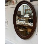 Large wooden frame bevelled mirror