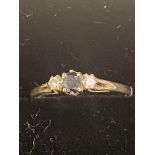 9ct Gold ring set with sapphire & 2 diamonds