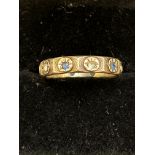 9ct Gold band ring set with sapphires & cz stones