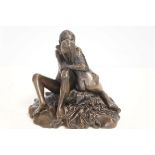 Resin figure of a nude couple