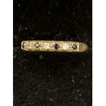 9ct Gold ring set with 4 sapphires & 3 diamonds We