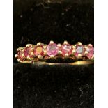 9ct Gold ring set with 7 rubies Weight 1.9g Size Q