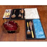 Three cased cutlery sets and a Carlton ware leaf dish