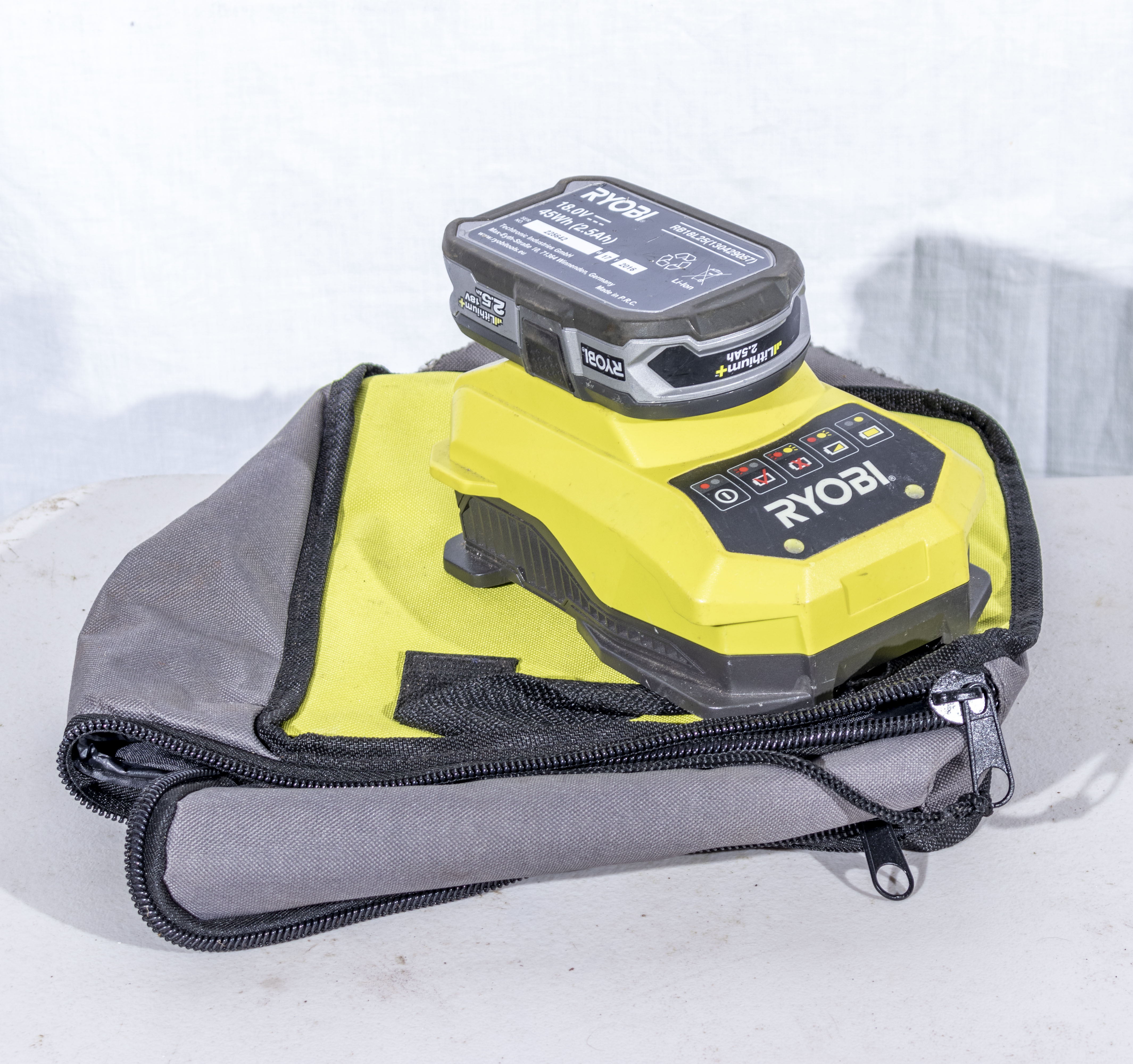 Ryobi One+18v battery charger and battery plus one other