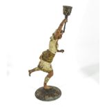 A painted spelter figure