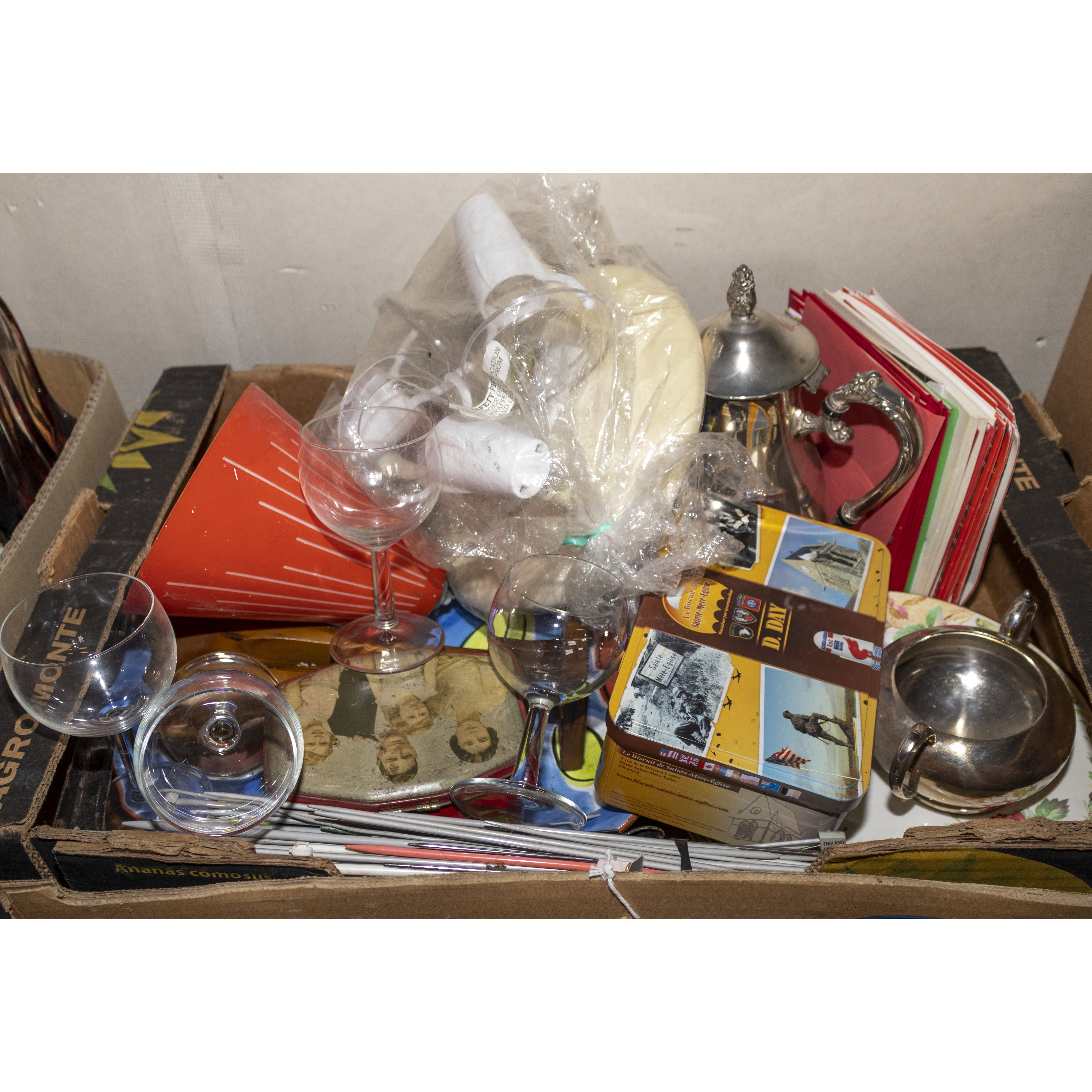 A box of assorted pottery and glass