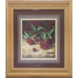 A small framed print of cherries