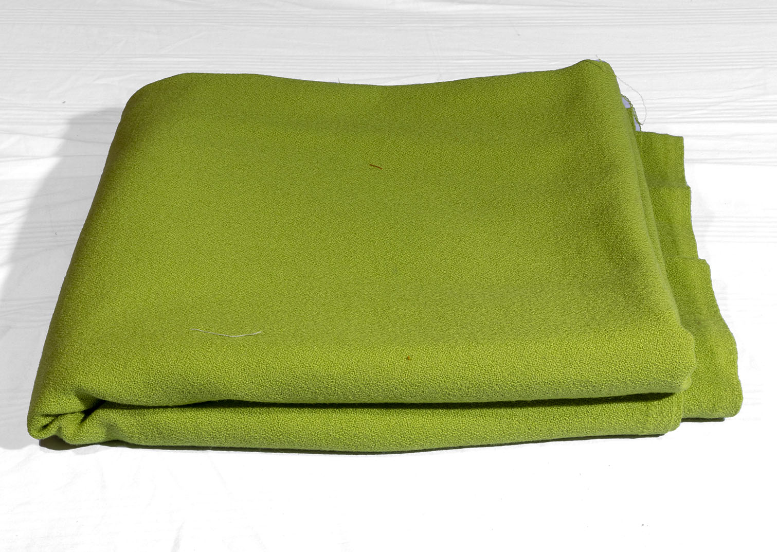 A piece of lime green fabric, multiple uses size 2.90mtr x 1.42mtr