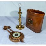 A leather magazine case, lamp and a barometer